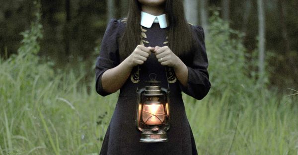 Parable of the Ten Virgins lady in dress holding lamp