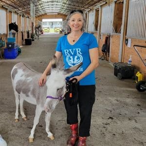 Shirley Alarie and Lulu the mini donkey at RVR Horse Rescue