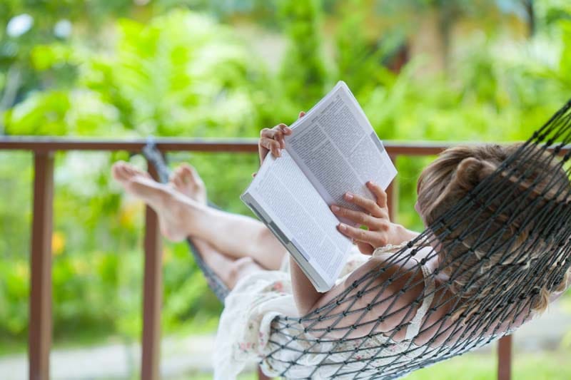 Keeping the Sabbath - lady reading in a hammock